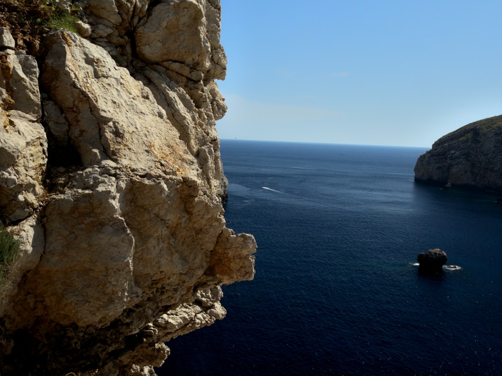 From the promontory of Capo Caccia you can enjoy a magnificent view to the Gulf of Alghero and the nearby island of Foradada.