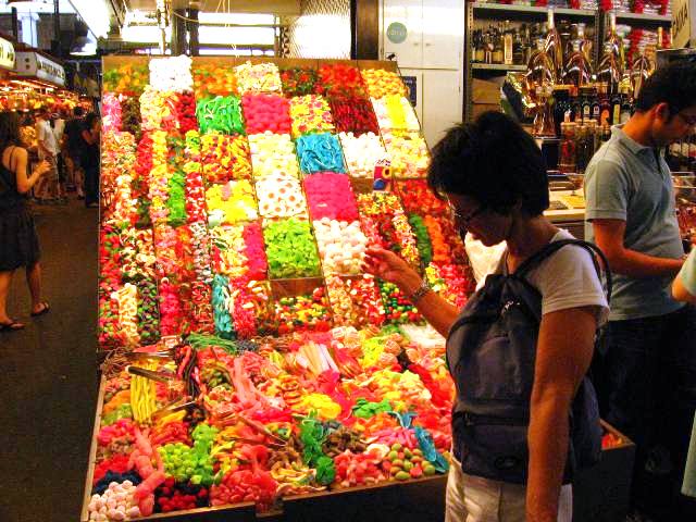 Sweets in Boqueria market in all of colours - Barcelona Spain 