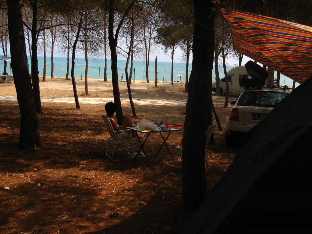 Camps of Eraclea Minoa are positioned under white cliffs in sparse pine forrest close the sea - Sicily, Italy 