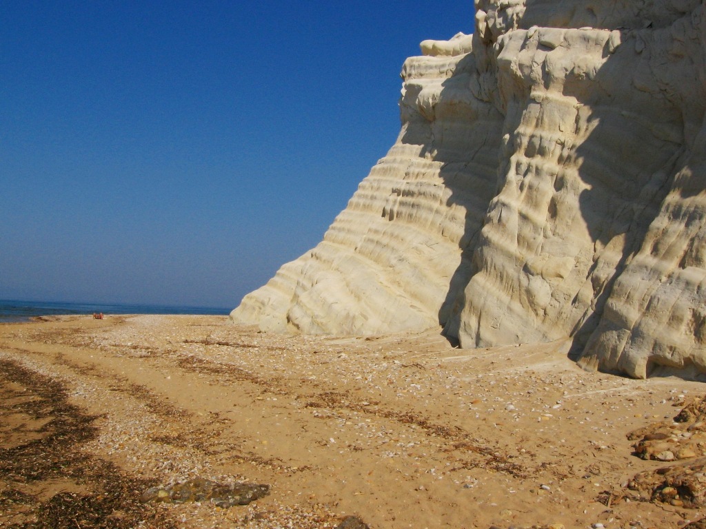 The blinding white of the cliffs and blue of the sea this is a beach of Eraclea Minoa - Sicily, Italy 