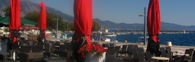 The seafront of Kalamata is area with hotels, cafes restaurants, ice cream parlours and bars, the beach is clean and the water is clear and safe for swimming - Kalamata Greece 