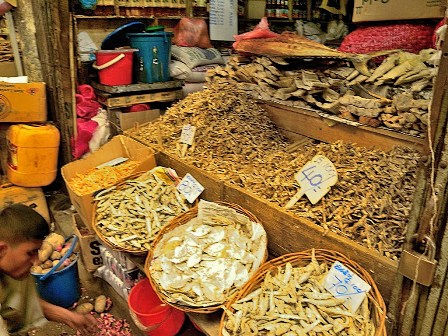 Through the market of Kandy drying fish