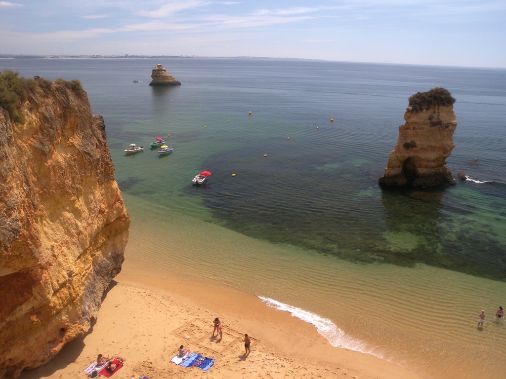 Dona Ana beach in Lagos is embraced by cliffs, which offer shelter from any sea breezes and the magnificent rock formations offer a fabulous sight from the beach - Portugal