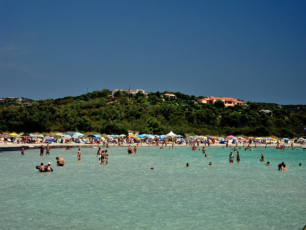 Shalownes of the Brandichi beach is a pleasant place for family holidays - of San Teodoro, Sardinia, Italy 