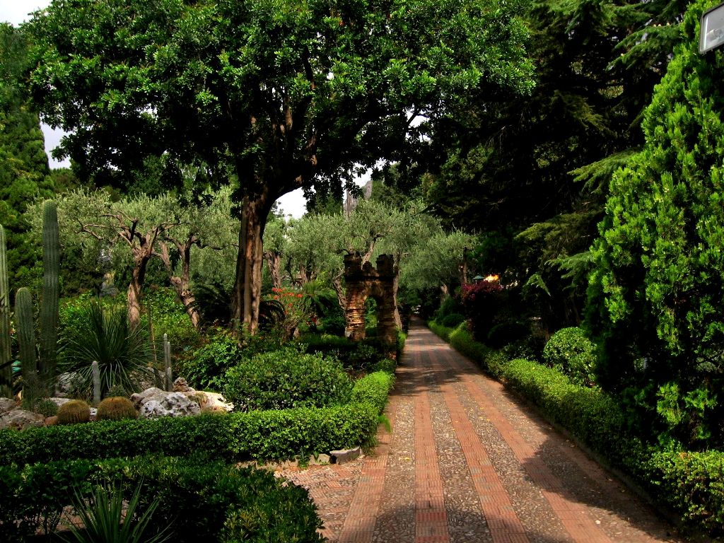 Giardini di Villa Comunale ? the mix of arches, arcades and exotic plants makes garden in Taormina pleasent for a walk - Sicily, Italy 