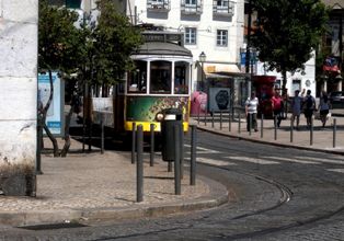 Lisbon has still many tradition trams which bump and screech around the network - Portugal