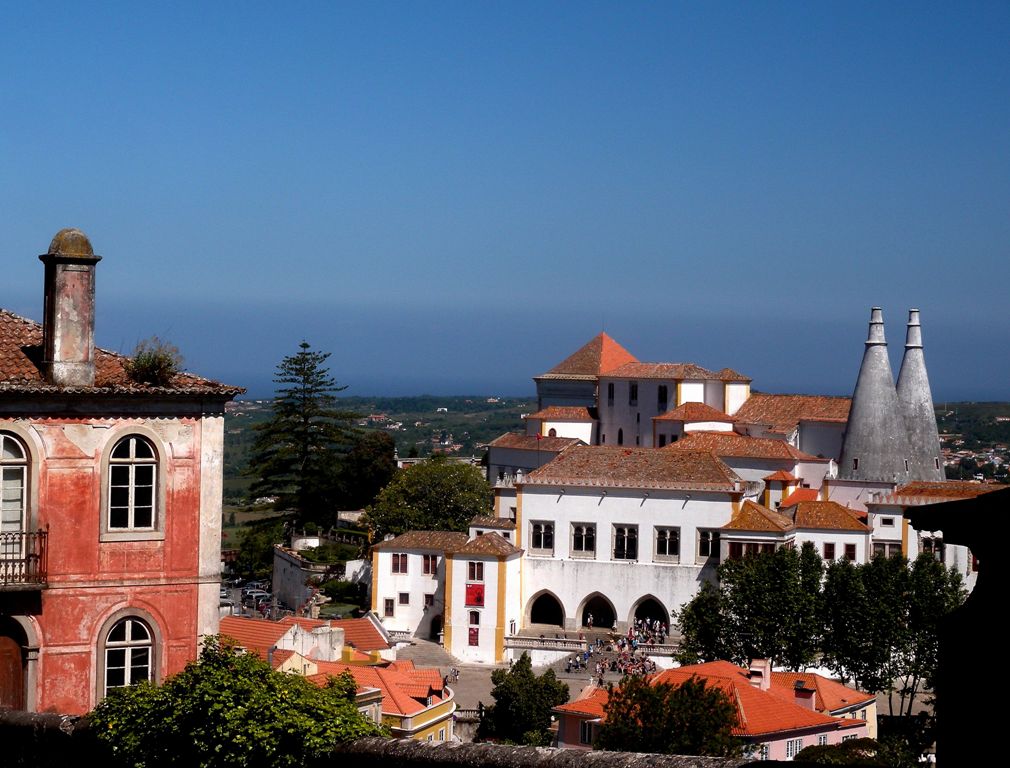 The building of National palace or Palcio da Vila with its twin chimneys stands in the center of the town of Sintra